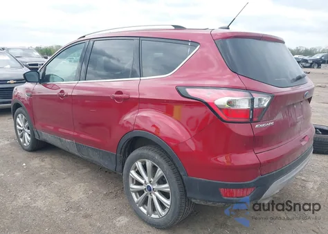 2017 Ford Escape Titanium z USA, uszkodzony, nr VIN 1FMCU9J95HUE90048